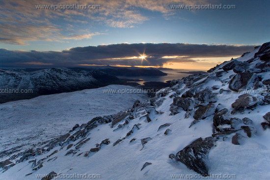 Image: Approach to the summit of The 
                   Clisham (An Clisham) the highest mountain on Harris
                   and indeed the Hebrides. Winter sunset over a snow covered landscape.